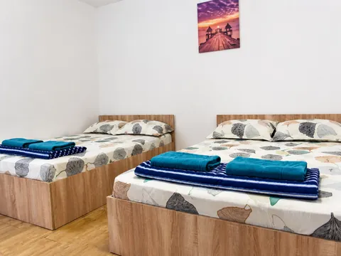 Cameră triplă cu două paturi